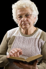 Old woman and the Bible