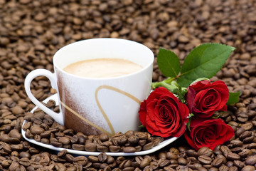 cup of coffee and red roses