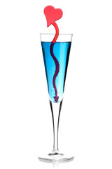Blue champagne alcohol cocktail with red heart decoration