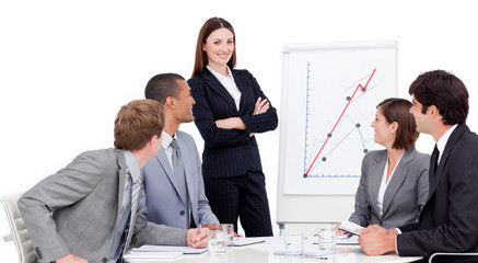 Smiling businesswoman giving a presentation