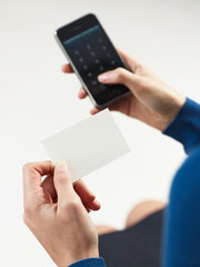 Obraz premium business woman holding business card