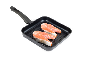 trout steak at grill pan