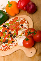 Fresh italian pizza and vegetables