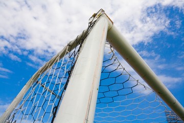 STADIUM - Football goal corner on blue sky