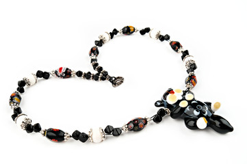 Handmade glass beads lined with a cat in the form of heart