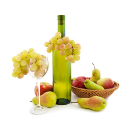 Bottle of white wine and various fruits