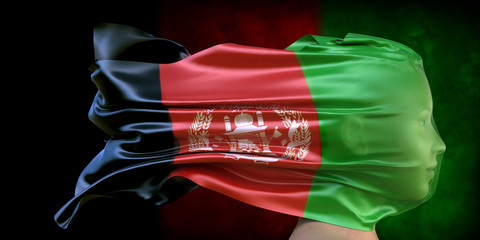 Side view of person face covered with flag of Afghanistan