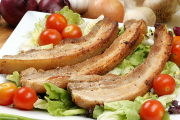 boneless streaky slices with salad and tomato
