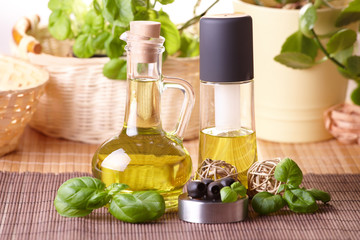 Two bottles with olive oil and grape seed oil