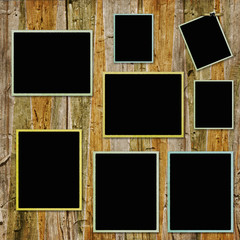 vintage frames on wooden background