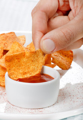 tortilla chips with hot salsa mexicana.