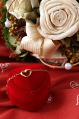 Golden necklace with heart