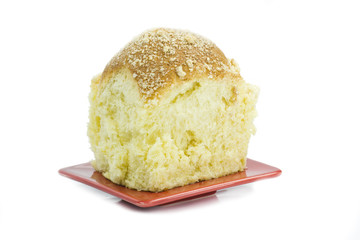 Bun on red plate