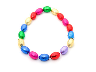 easter eggs in circle over white background