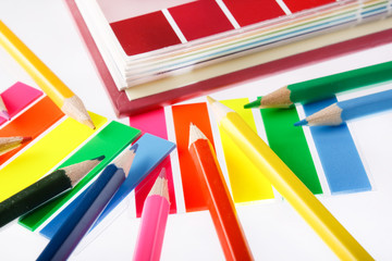 Assortment of coloured pencils with page markers.