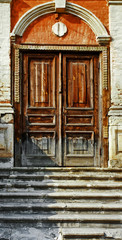Fototapeta na wymiar old wood door of an ancient building