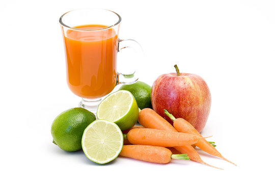 fruits, carrots and glass of juice