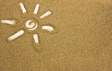 Sun shape drawn in sand