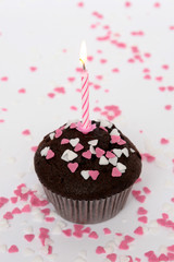 Schokoladenmuffin mit Kerze