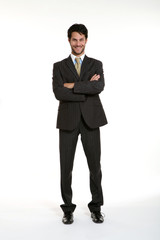 Obraz na płótnie Canvas Portrait of a young businessman standing comfortably.