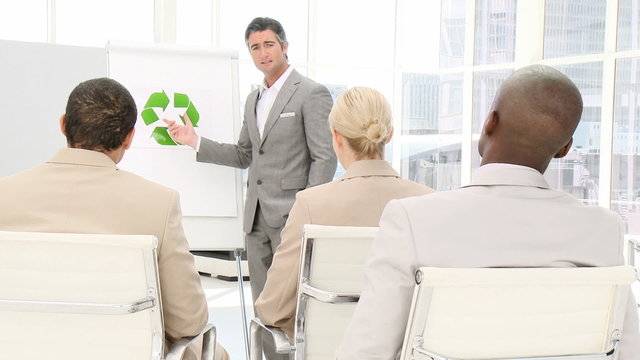 Mature male executive presenting the green technologies