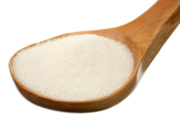 Fototapeta na wymiar Sugar in a wooden spoon