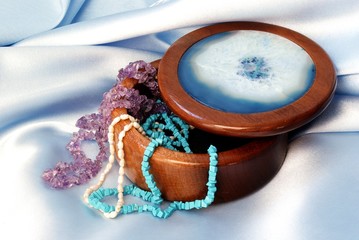 lady's jewelery in wooden decorative box