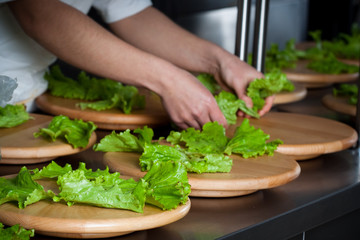 Preparing salad for catering food