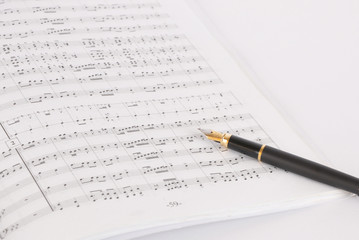 Pen on a musical notebook