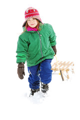 Kind zieht einen Schlitten