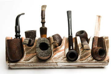 Obraz na płótnie Canvas pipe collection on modern pipe rack
