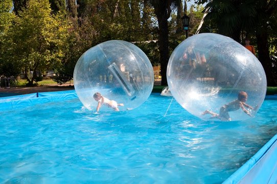 Children in the water-ball