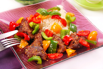 fried liver with paprika and sesame seeds