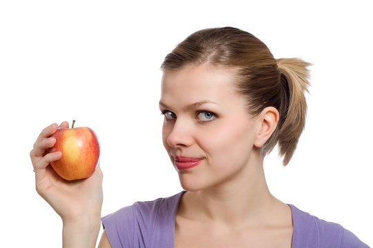 young blonde woman with a red apple