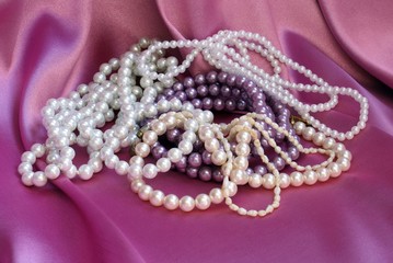 pearls on pink satin