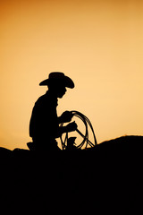 cowboy rodeo sunset silhouette