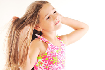 Fototapeta premium Little blond girl with long hair