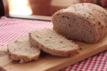 Fototapeta na wymiar Sliced wholemeal bread with seeds