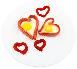 Fried sausages in the form of heart on a white background