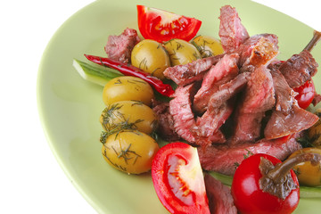 beef meat served on green