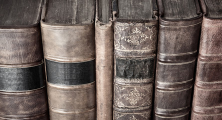 Row of old leather bound books