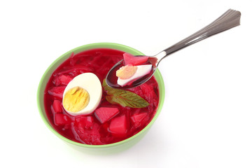 red vegetable soup over white