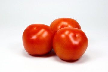 Three red tomatoes