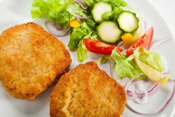 Fried pork chop with vegetables