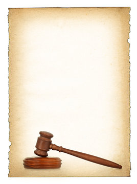 Wooden Gavel Against Old Dirty Paper Background