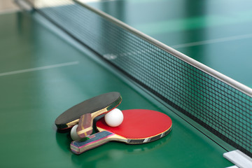 Table tennis rackets and ball - obrazy, fototapety, plakaty