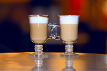 Cafe Coffee - Latte into two glasses