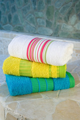Colorful towels in a relaxed spa setting