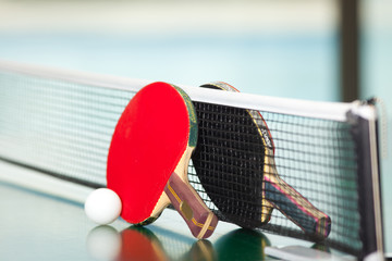 Table tennis rackets and ball - obrazy, fototapety, plakaty