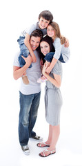 Obraz premium Cheerful parents giving their children piggyback ride